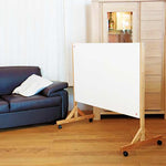 Laden Sie das Bild in den Galerie-Viewer, Mobile Infrarotheizung spaceInmotion30 im Wohnzimmer
